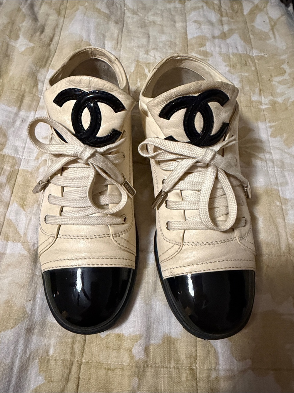 CHANEL Cream Leather Sneakers with Black Patent Toe and CC Logo